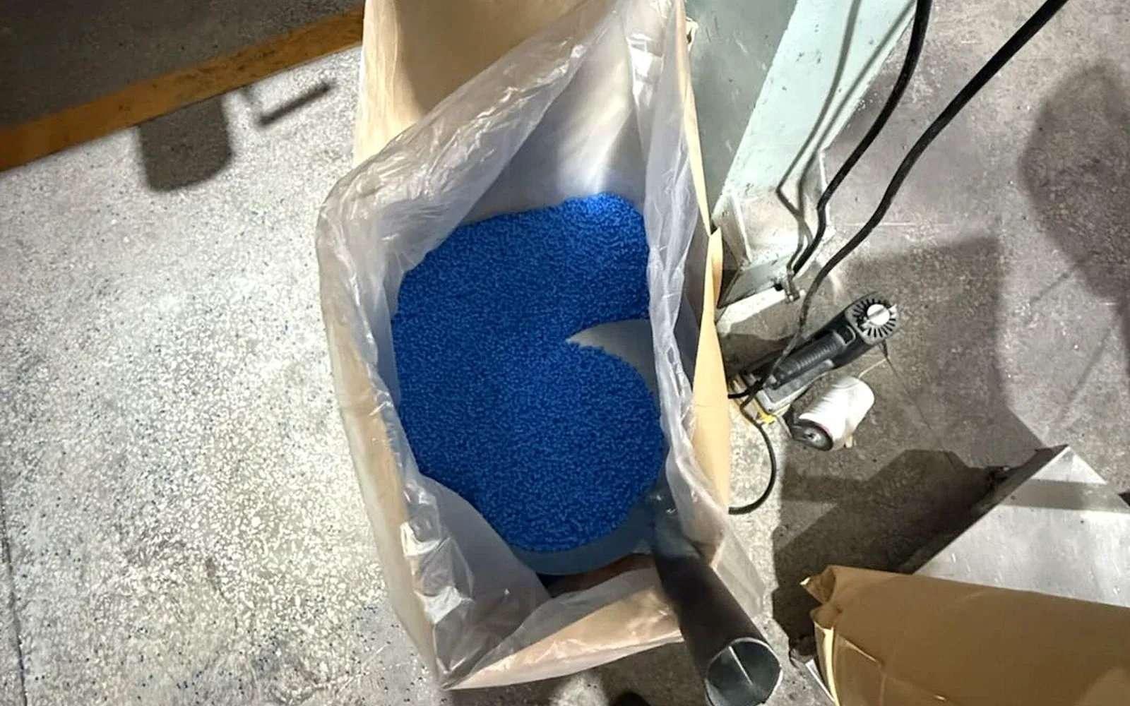 Bag of blue HZD8250 TPV thermoplastic vulcanizate compound