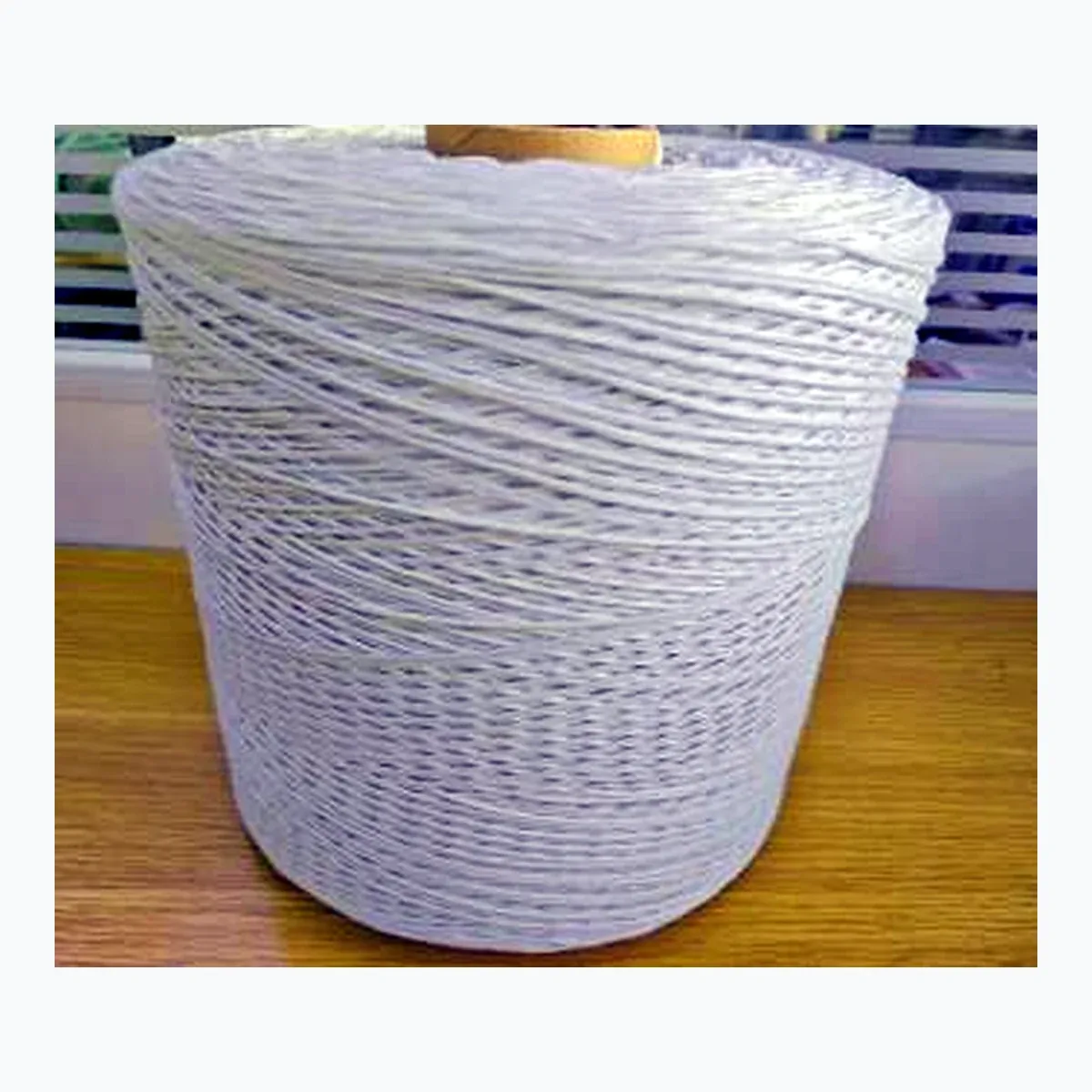 Cable filling rope on a large spool